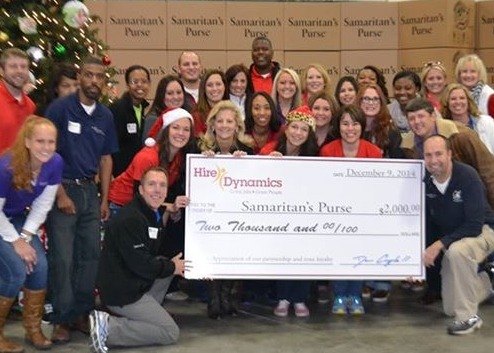 hiredynamics team with big check